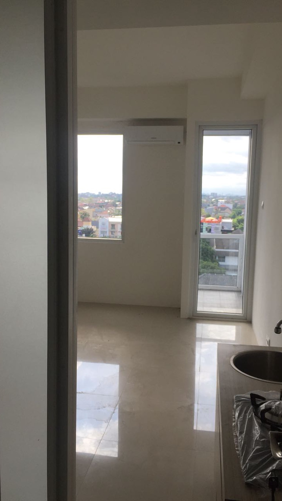 APARTEMEN DENGAN TIPE KAMAR STUDIO DI LOKASI STRATEGIS DI PUSAT KAMPUS DAN BISNIS
