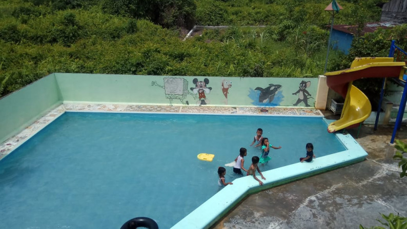 Rumah Cantik di Arifin Ahmad dengan Usaha Kolam Renangnya Rumah Cantik di Arifin Ahmad dengan Usaha Kolam Renangnya