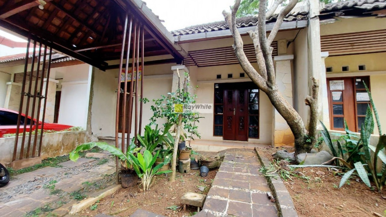 Rumah bergaya bali dalam cluster di Depok