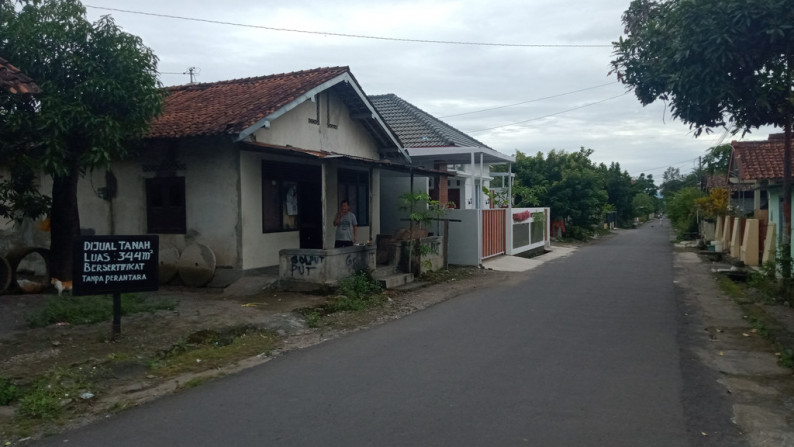 TANAH DENGAN BANGUNAN DI JL KADIROJO, HARGA SUDAH TERMASUK PAJAK