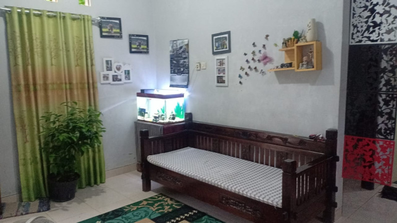 RUMAH TINGGAL MINIMALIS DI PERUM BANGUNJIWO GRIYA SENTOSA