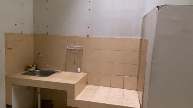 Rumah dalam perbaikan Di Taman Crista Bintaro Jaya Sektor 9