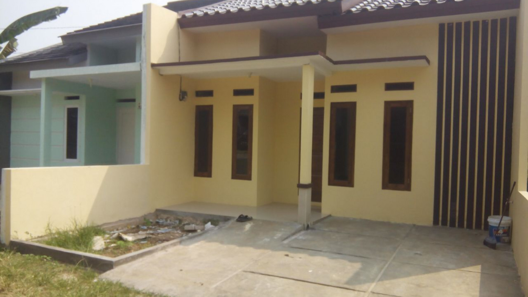 Rumah baru minimalis di lingkungan asri