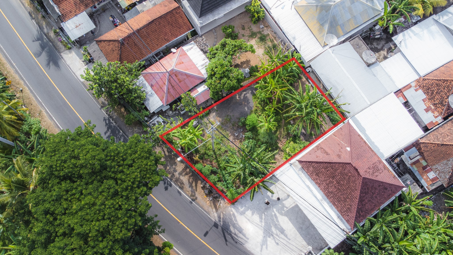 Land next to the main road for sale