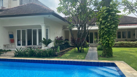 house one storey unfurnish with spacious garden and pool at kemang barat 