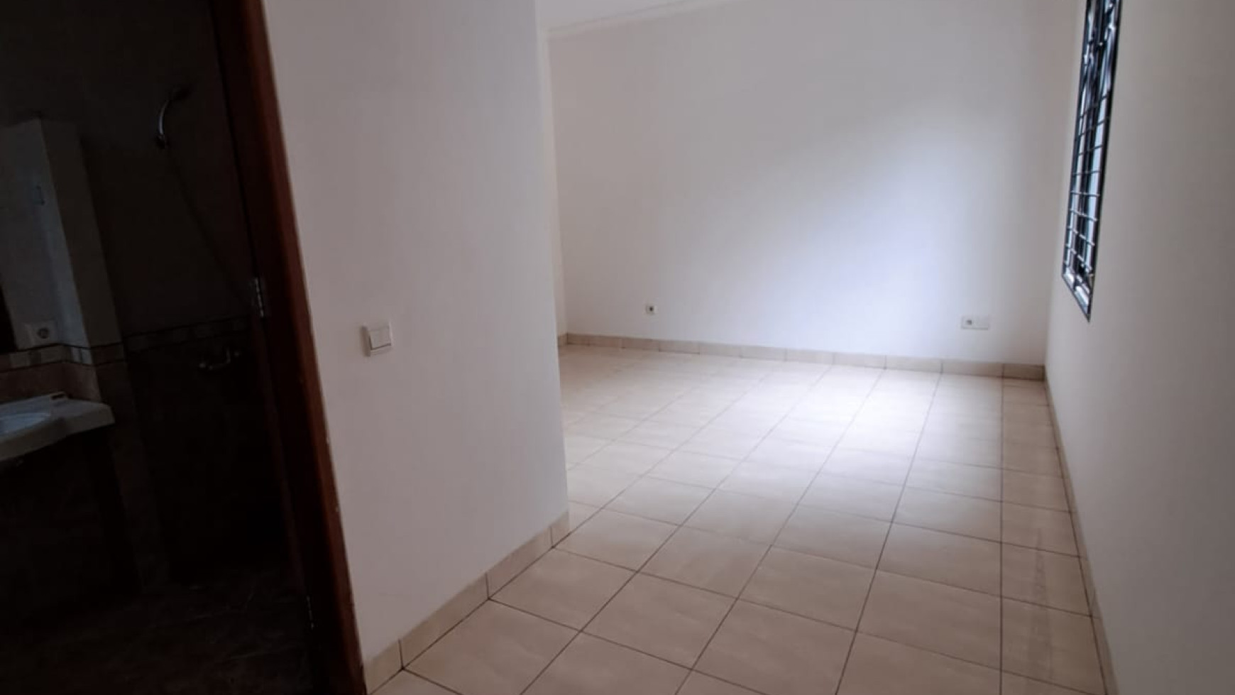 Rumah ahalaman belakang luas di The Green