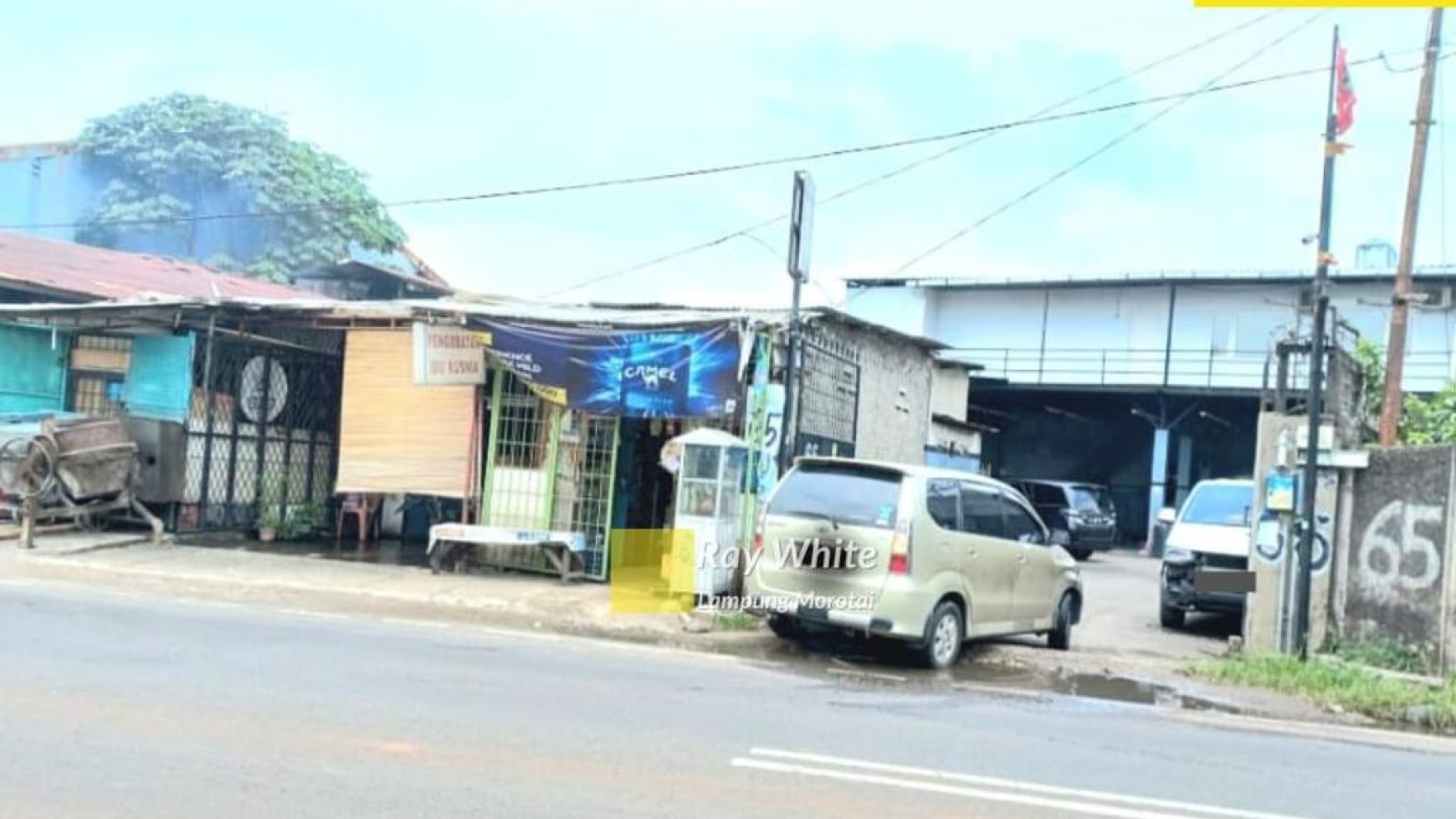 Bangunan bengkel plus tanah komersil dijalan Raya Meruya Ilir Jakarta Barat DKI Jakart