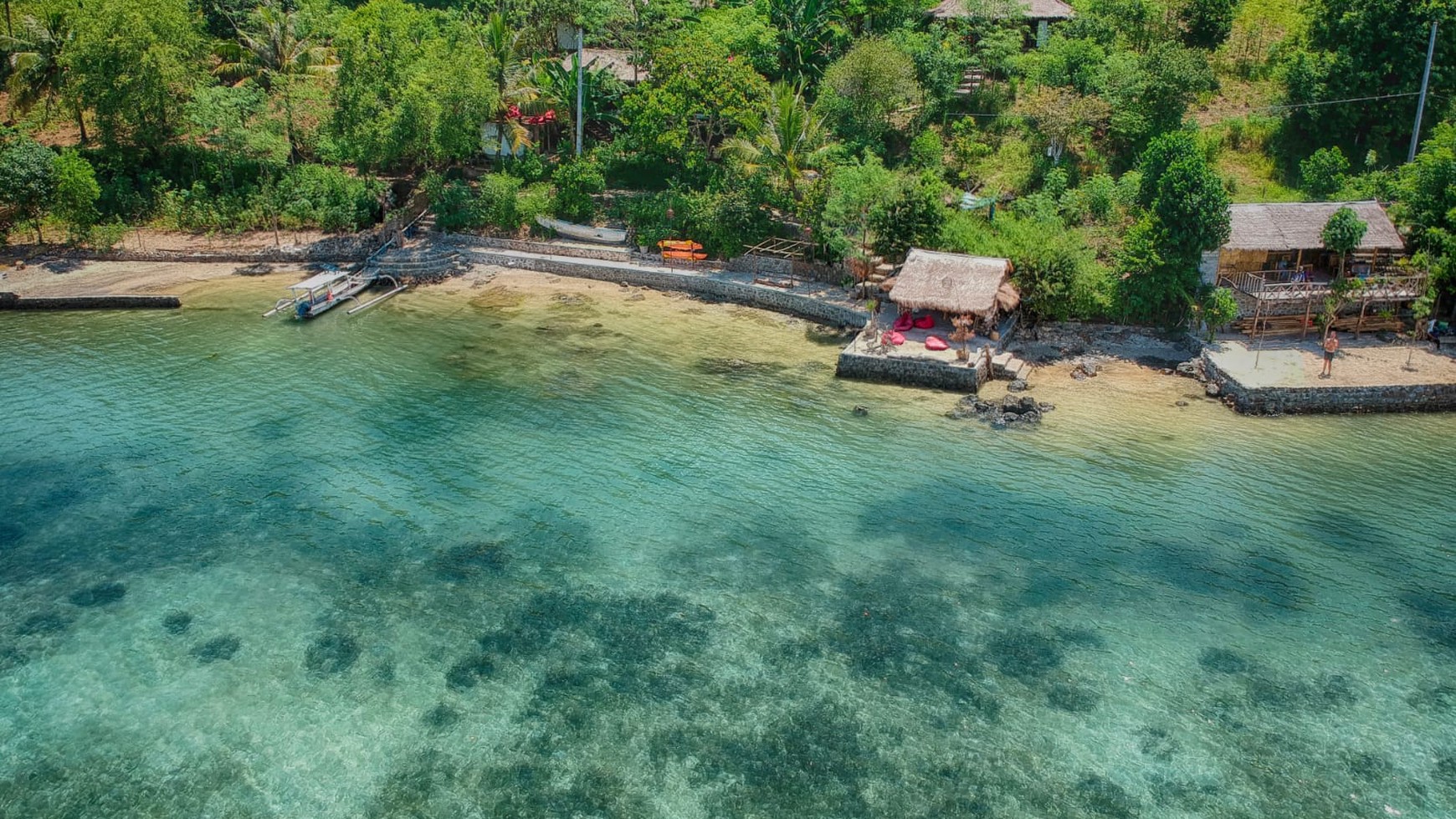 Ocean front resort for sale with pristine beachfront available with legal entity ( PT. PMA )  in Gili Gede , Lombok 