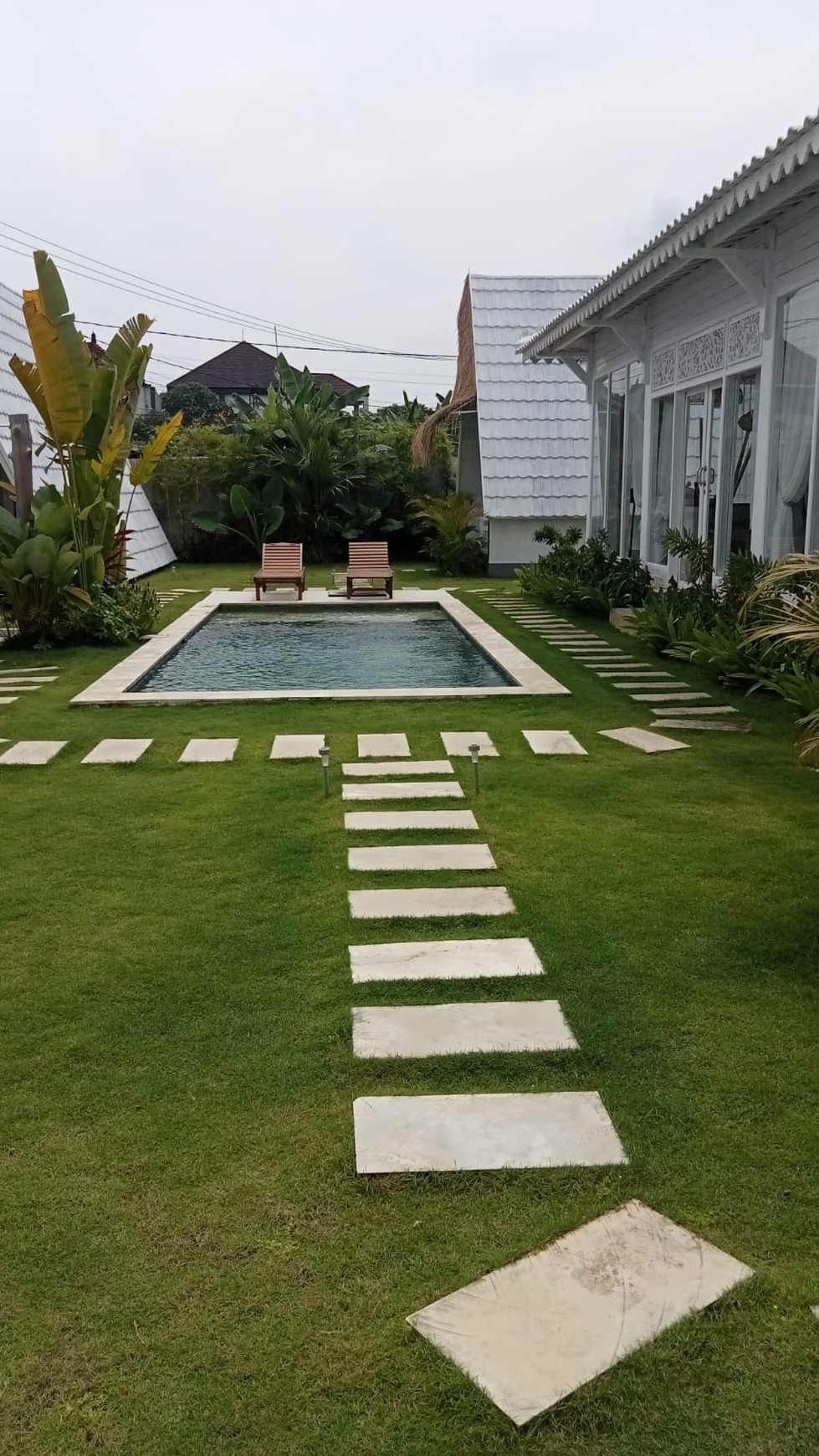 For Sale Leasehold - Brand new white villa with  Javanese ethnic interior  ( 4 unit bungalows and 1 joglo ) on main road Canggu 