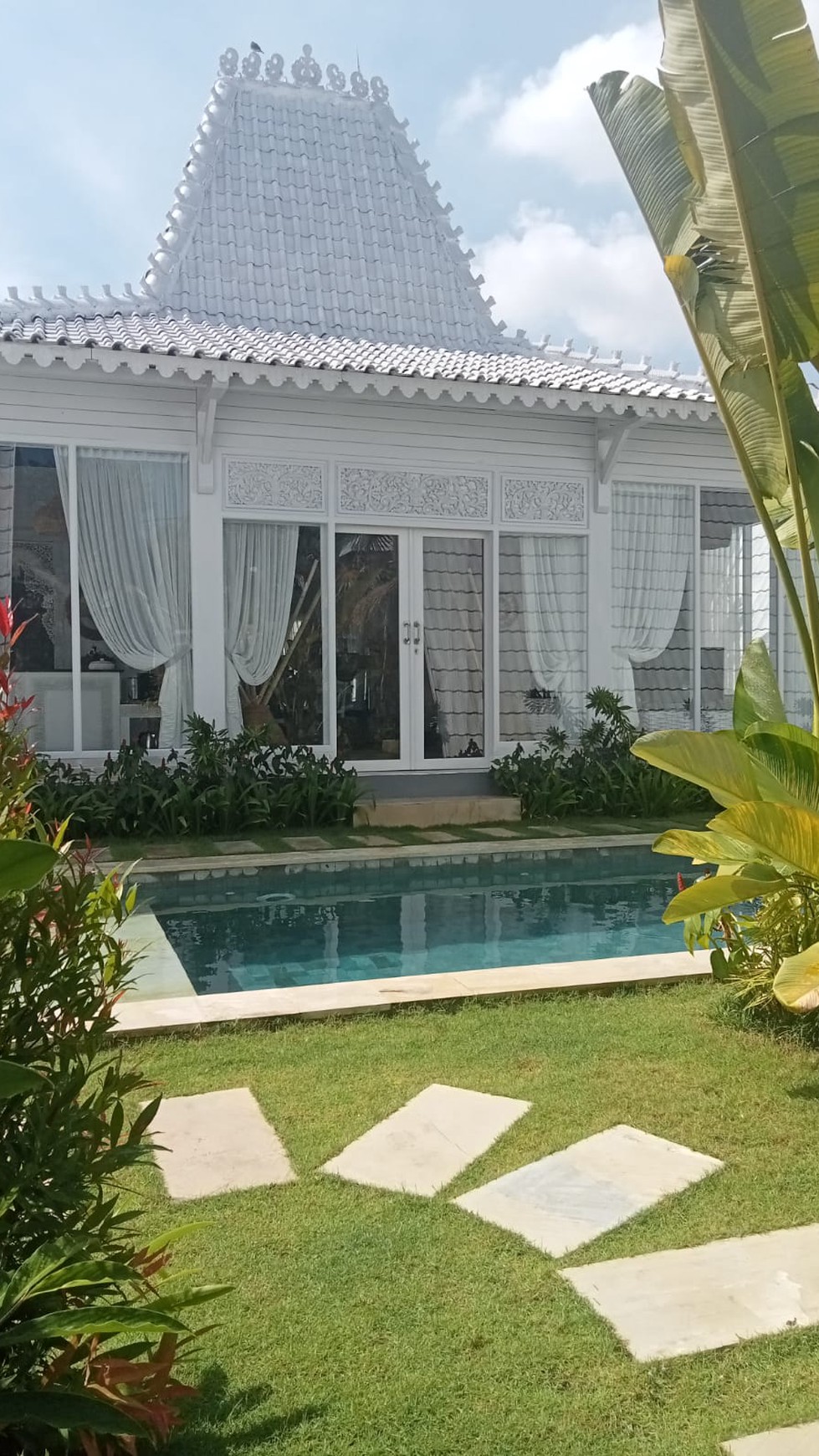 For Sale Leasehold - Brand new white villa with  Javanese ethnic interior  ( 4 unit bungalows and 1 joglo ) on main road Canggu 