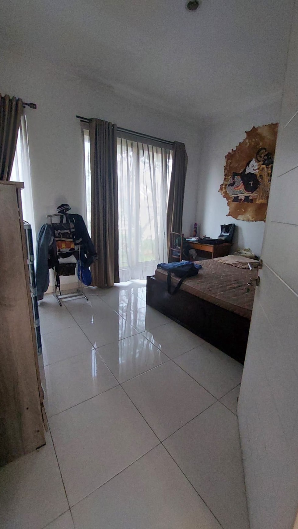 Rumah rapih, siap huni dalam cluster di Bintaro