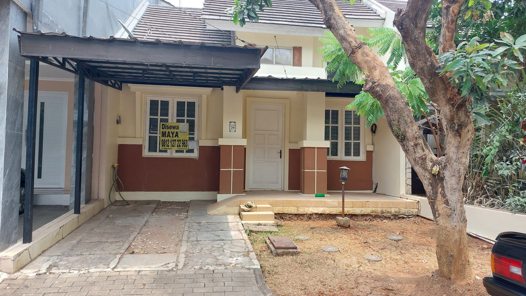 Rumah 1,5 lantai Kota Wisata