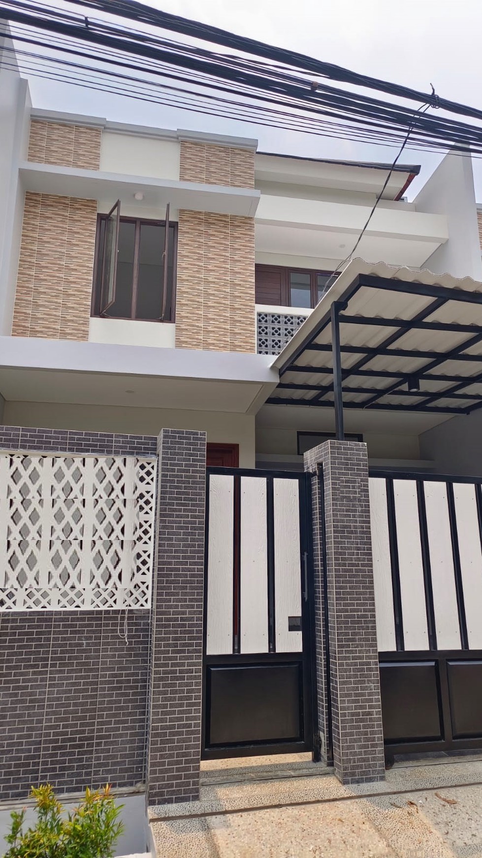 Rumah Brand New Minimalis siap Huni dalam Cluster