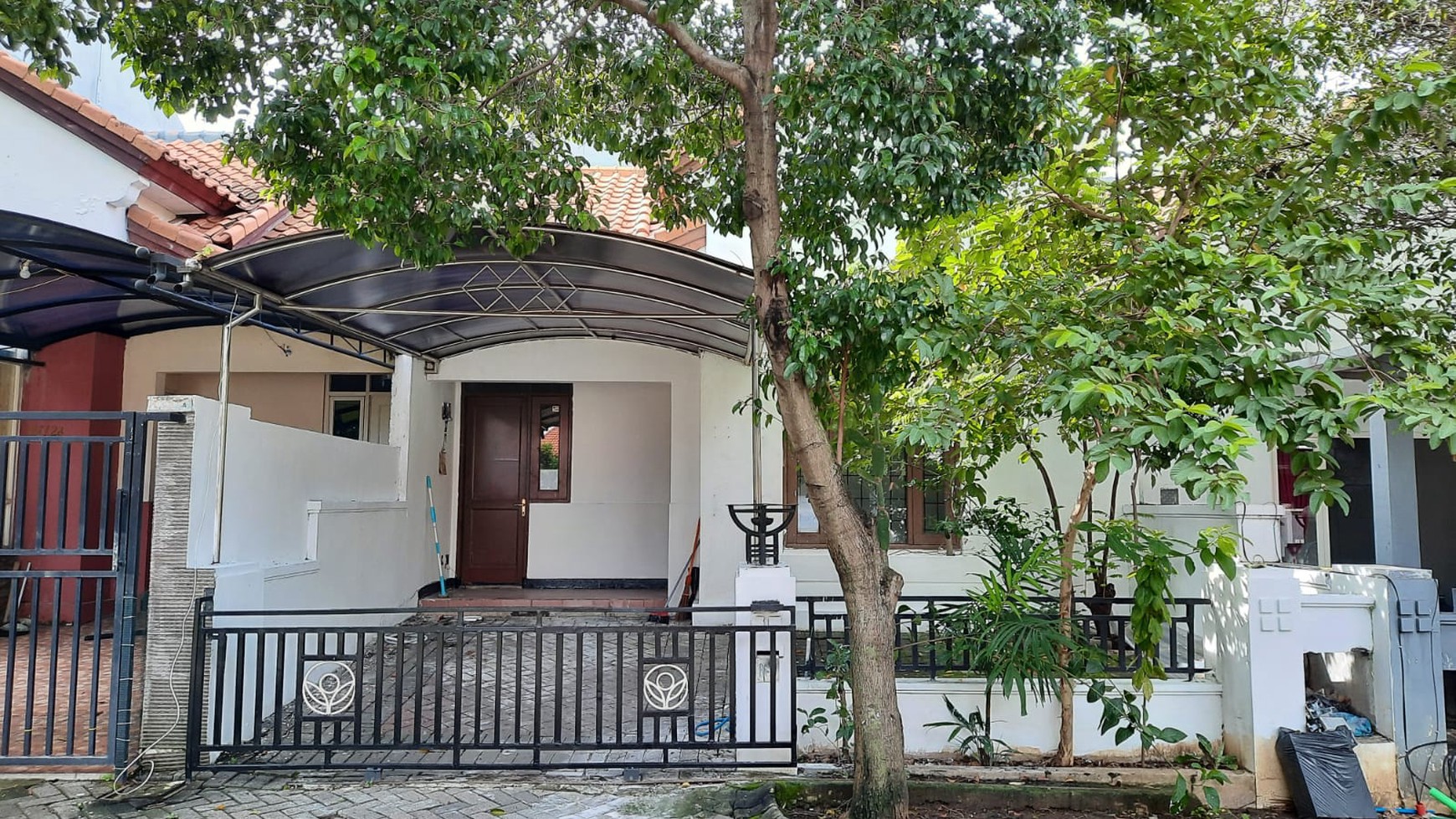 Rumah Taman Puspa Raya Citraland Surabaya