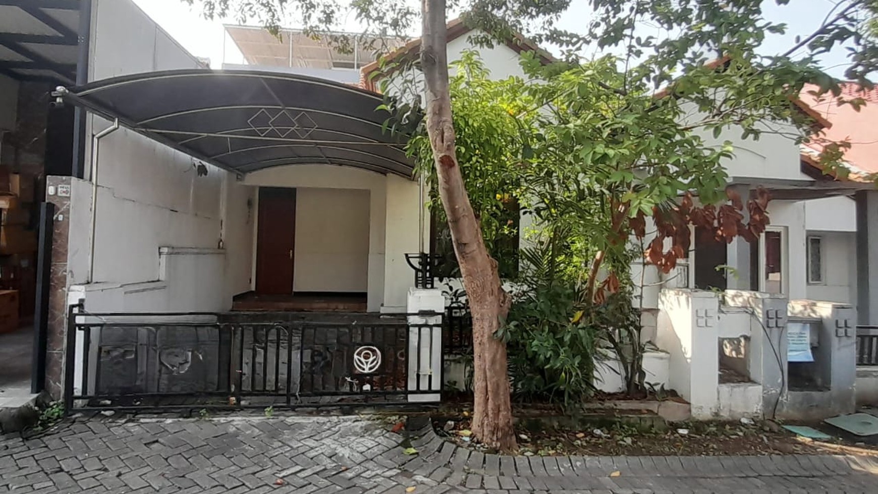 Rumah Taman Puspa Raya Citraland Surabaya