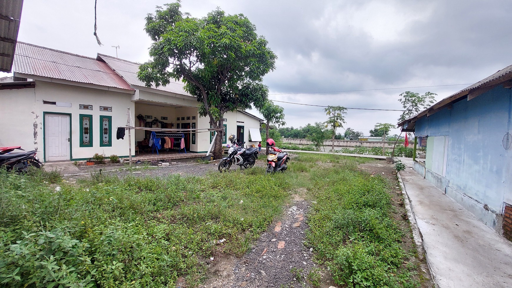 Tanah & Kontrakan Produktif nempel kawasan surya cipta Karawang