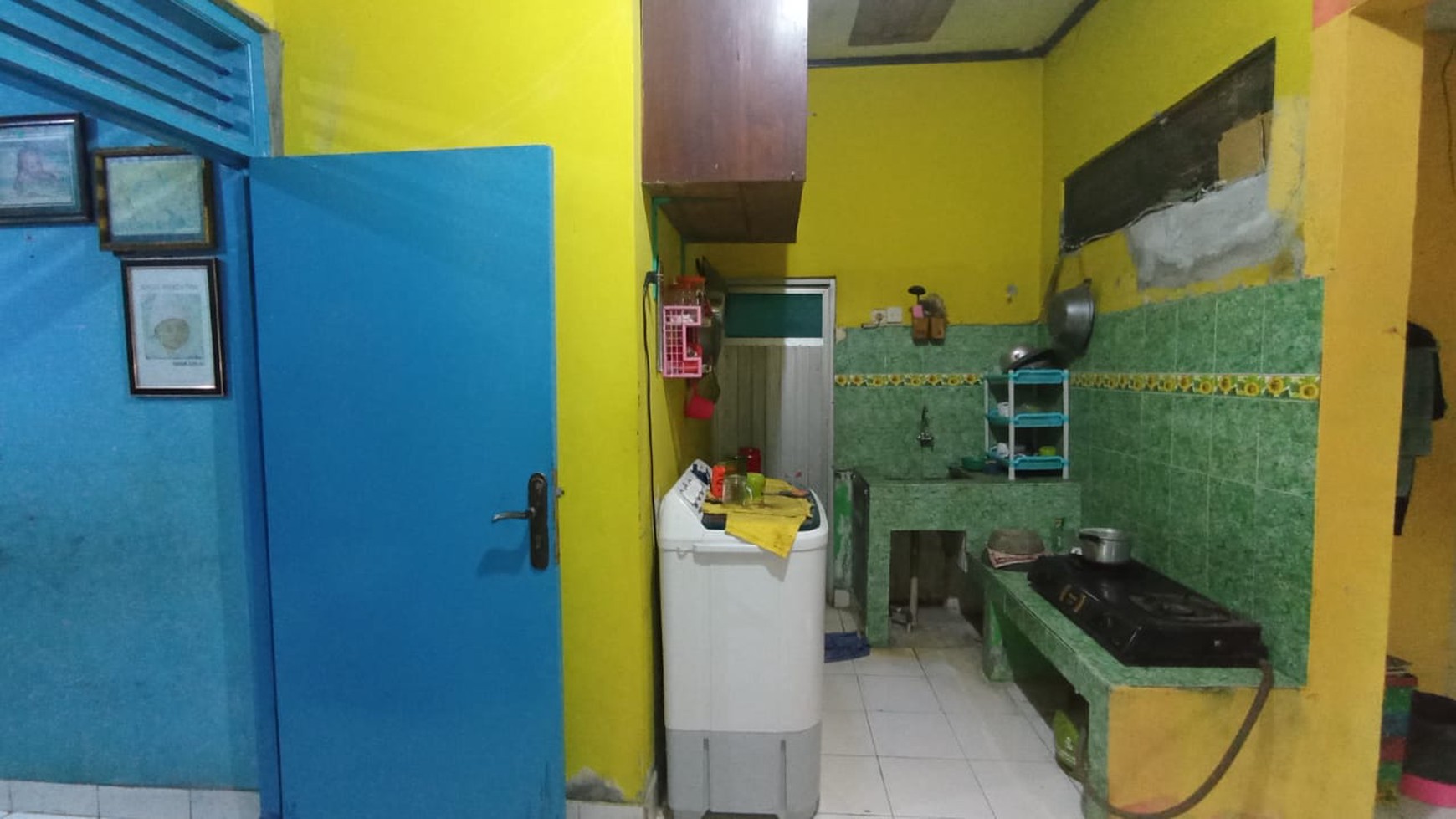 Dijual rumah dengan luas 200m2 di jl. raya kampung peusar curug Tangerang