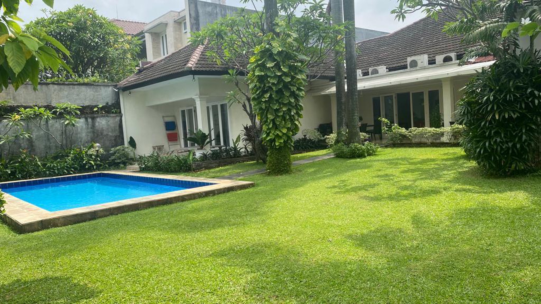 House 4 bedrooms with nice garden and swimming pool at kemang barat