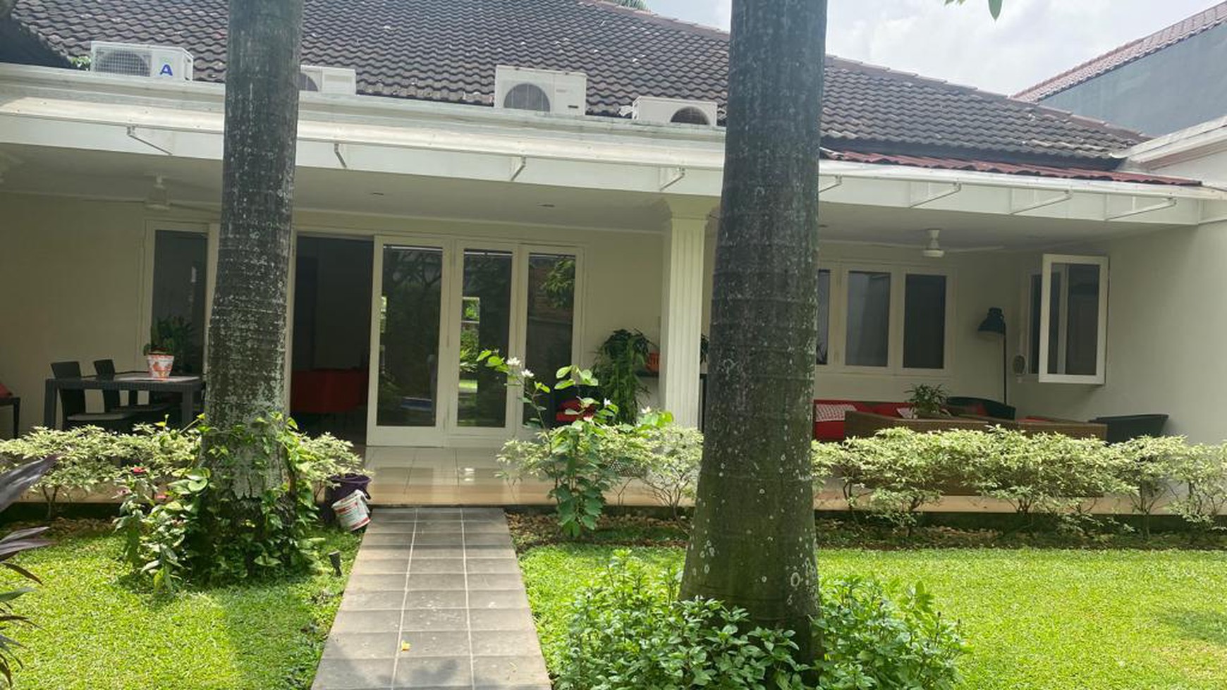 House 4 bedrooms with nice garden and swimming pool at kemang barat