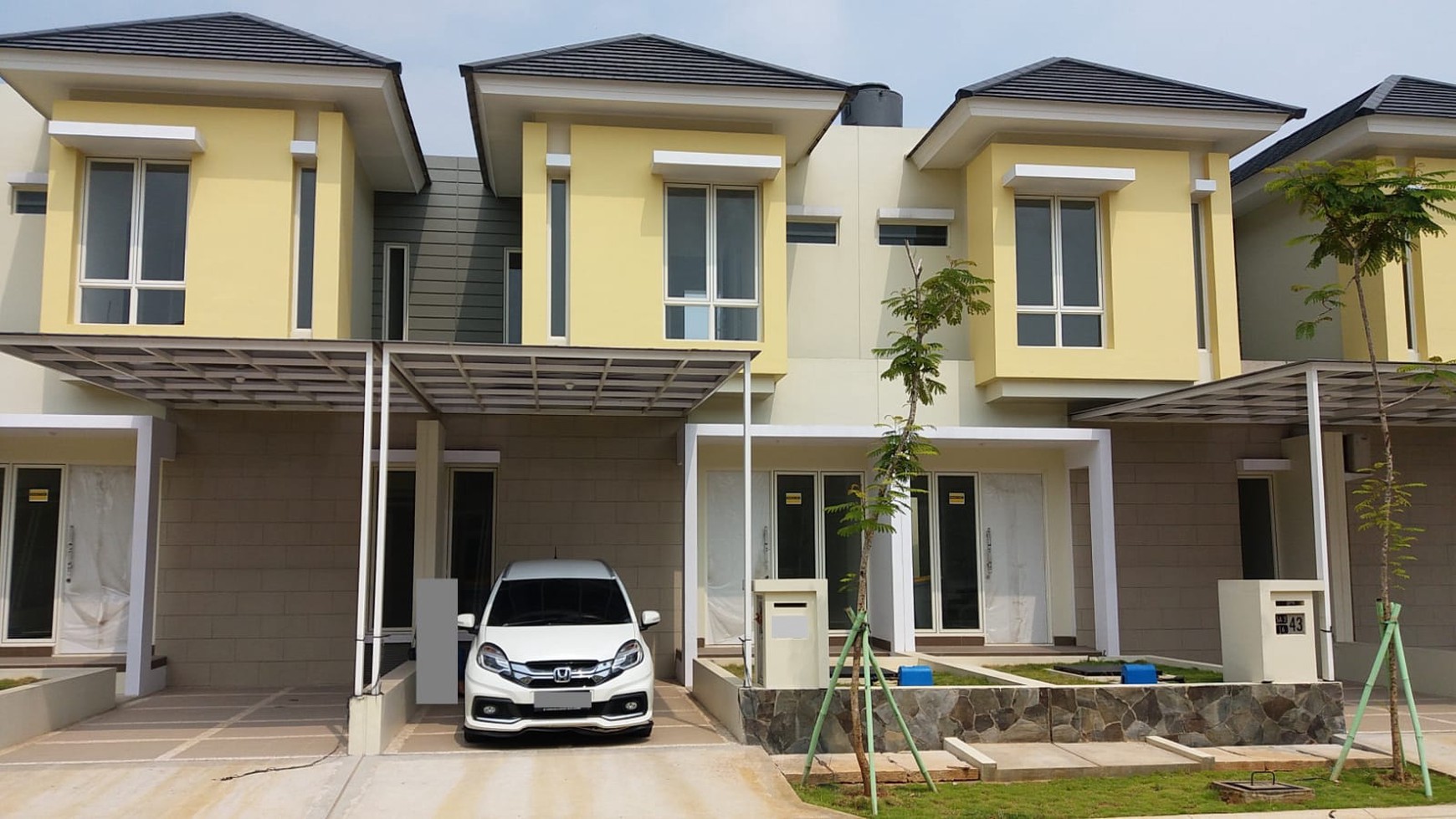 rumah cluster semi furnish kawasan kota harapan indah