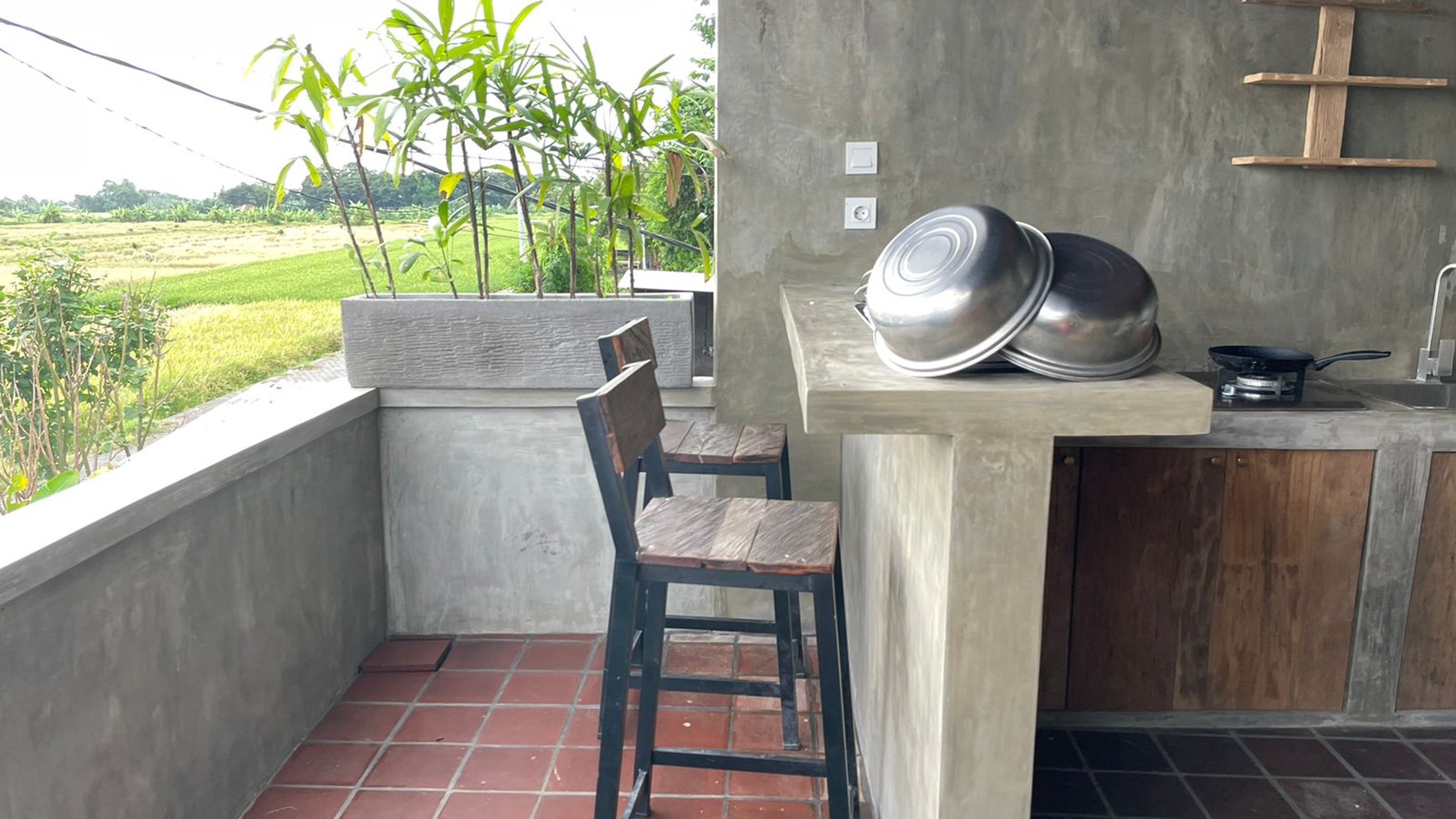 Comfortable house surrounded by rice fields