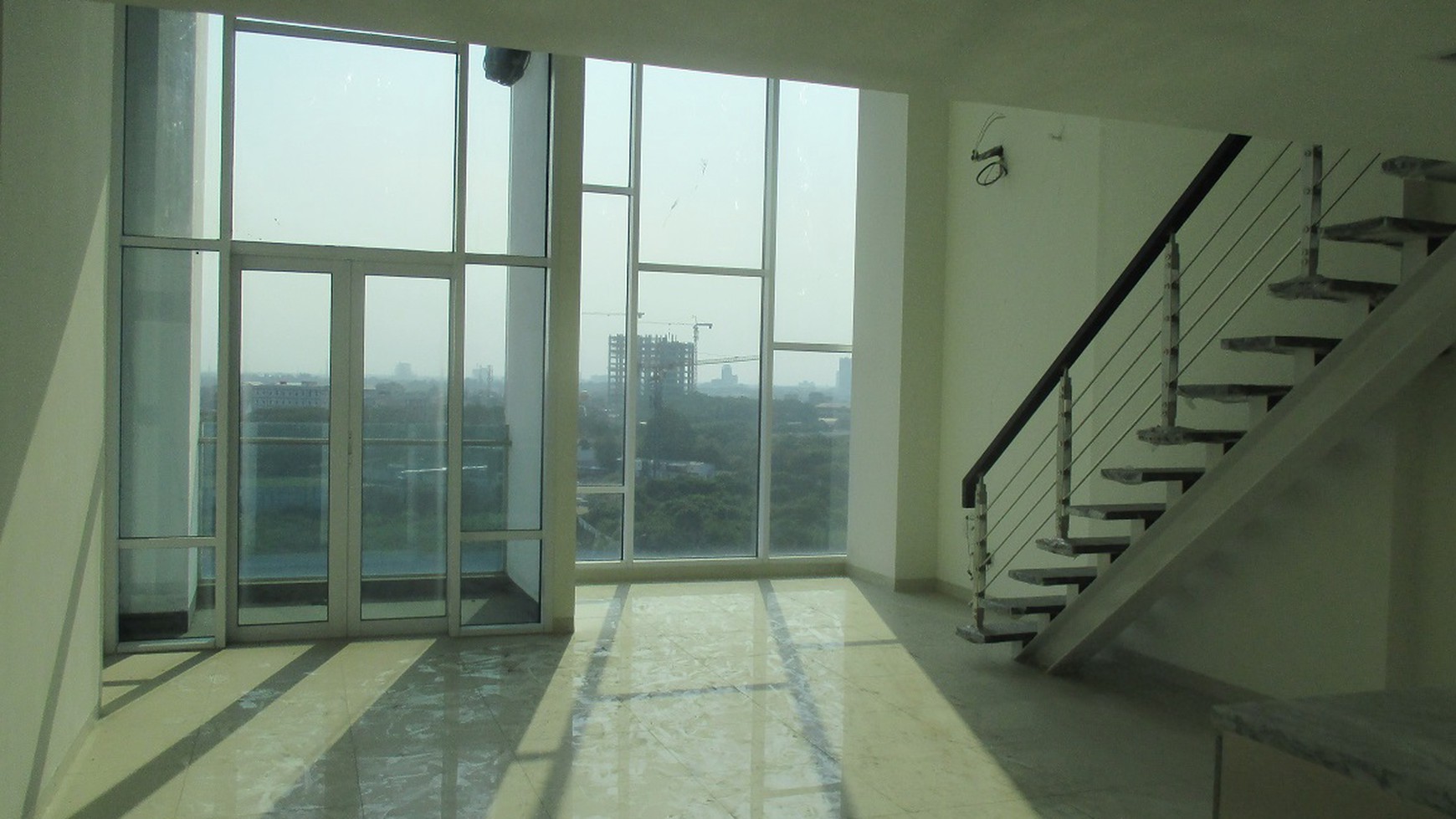 SOHO Apartemen Brooklyn Alam Sutera Tangerang Selatan dengan luas semigross 81,04 m2.