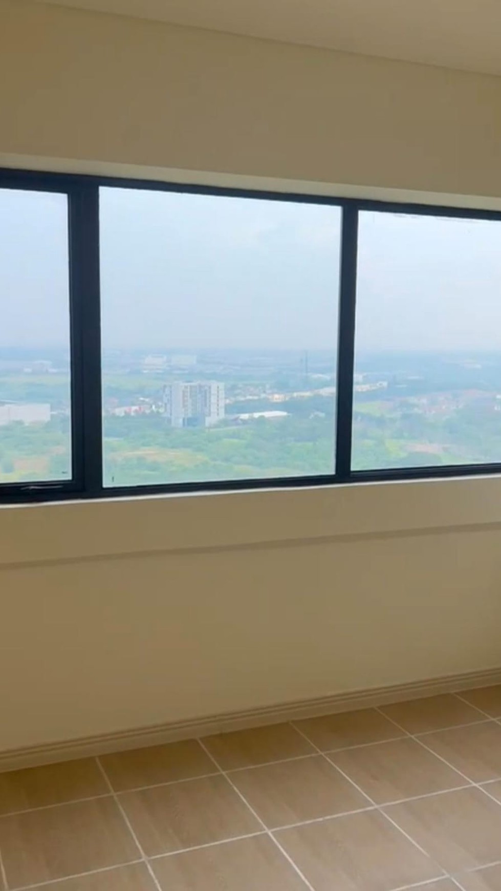 APARTEMEN MEIKARTA TOWER TIMBERLAKE VIEW JALAN DAN DANAU LANTAI 23