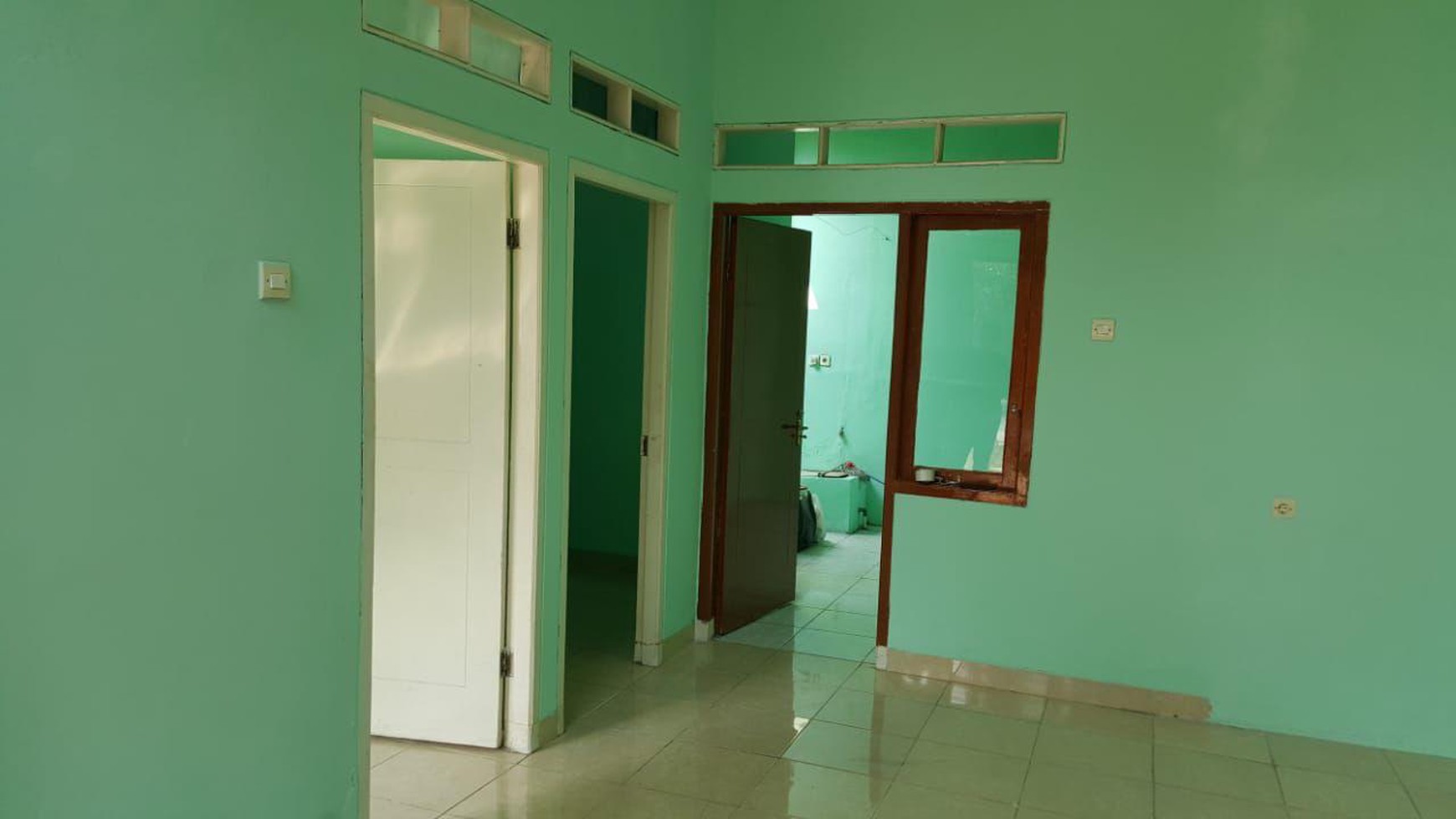 RUMAH TYPE HOOK DI PERUMAHAN GREEN GARDEN CLUSTER GREEN SIDE KARAWANG BARAT