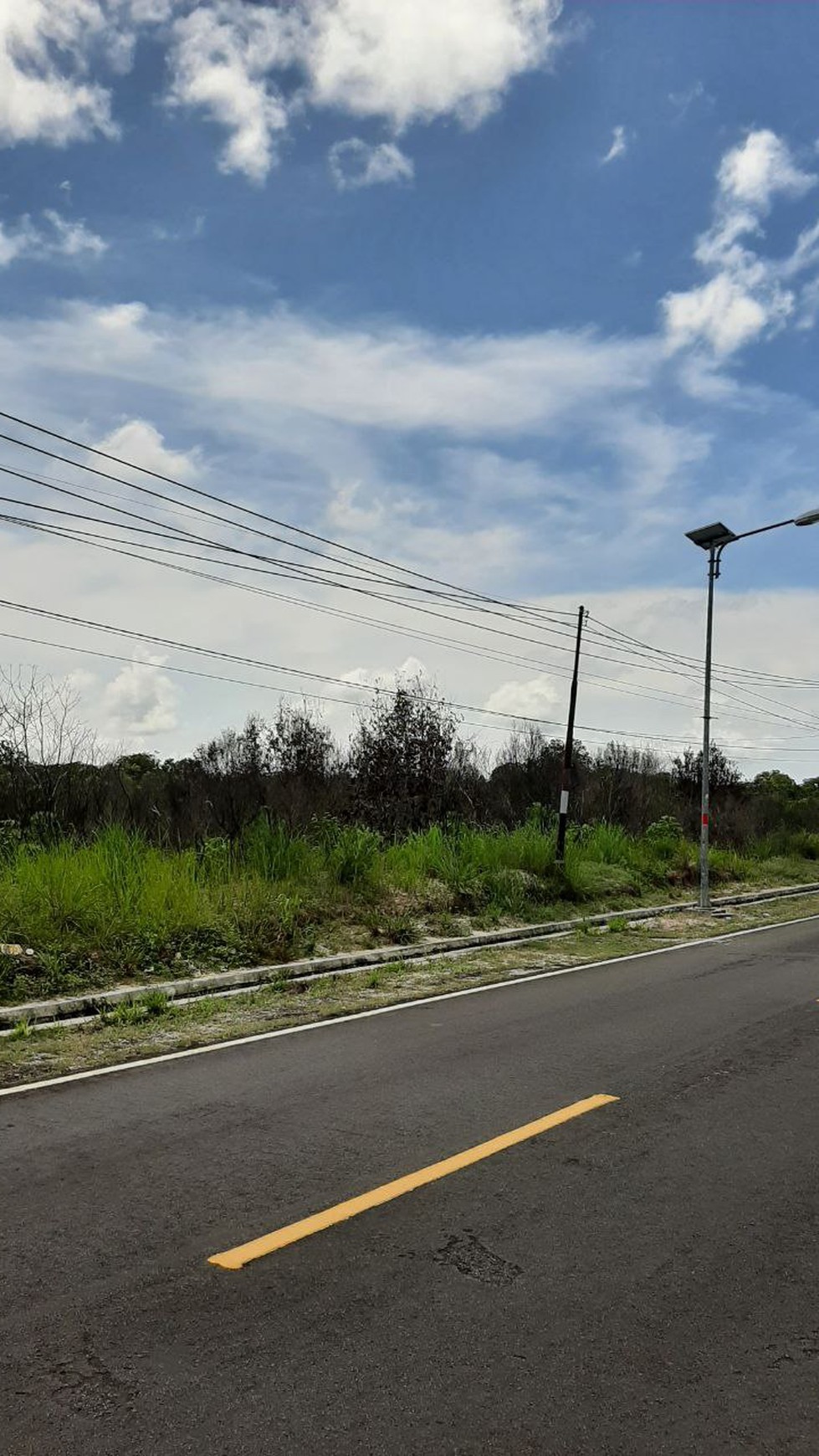 Tanah dekat kelenteng Sijuk, Belitung.