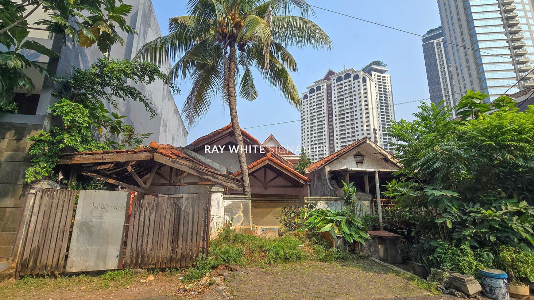 Rumah Lama Lokasi Strategis di Jl Martimbang Raya