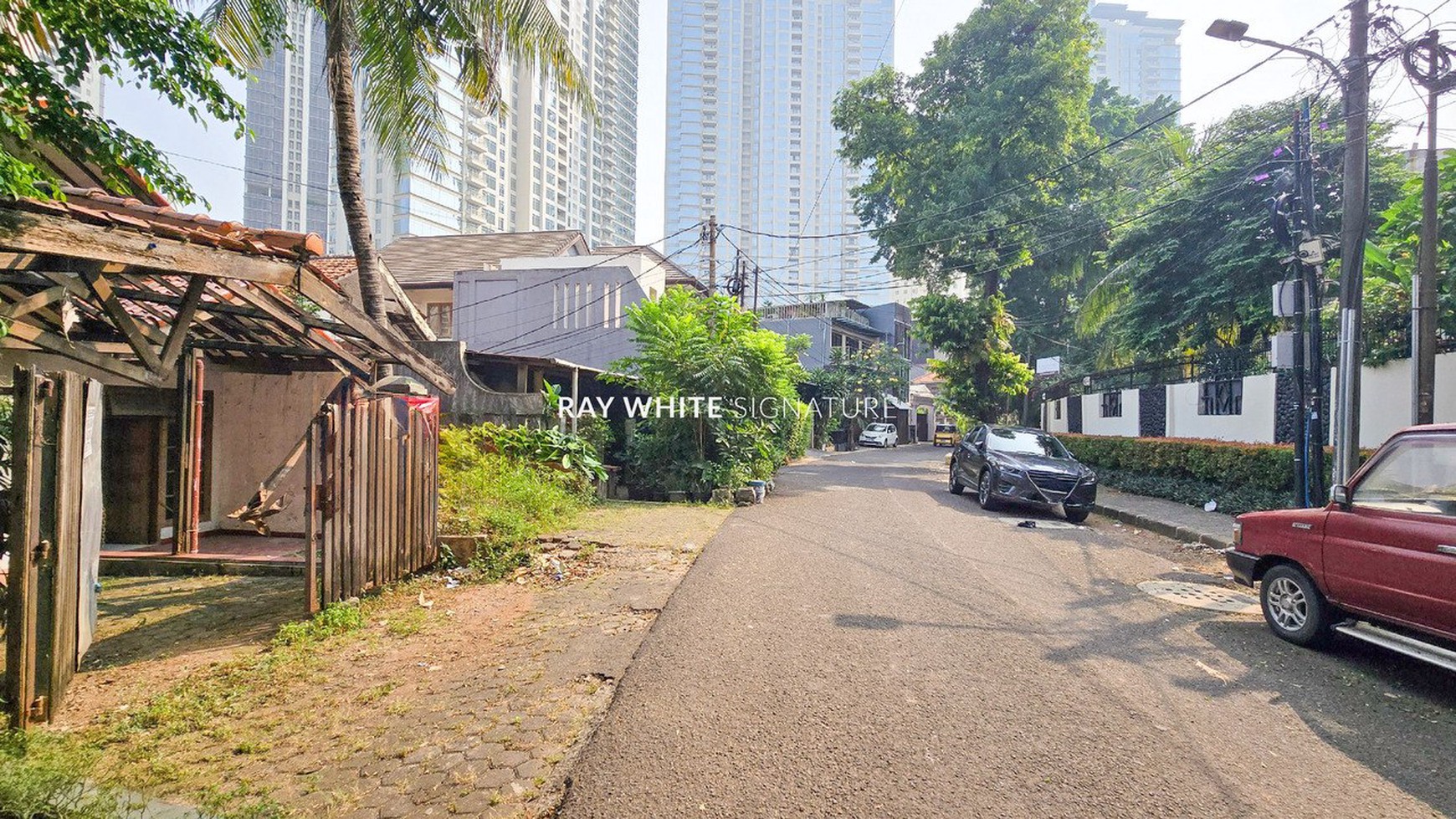 Rumah Lama Lokasi Strategis di Jl Martimbang Raya
