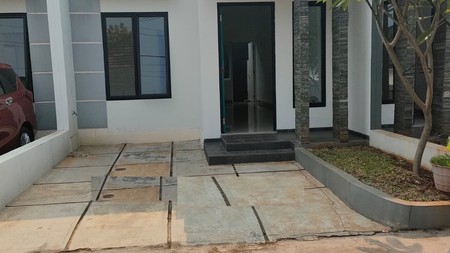 Rumah minimalis, bebas banjir dalam cluster di Pondok Karya 