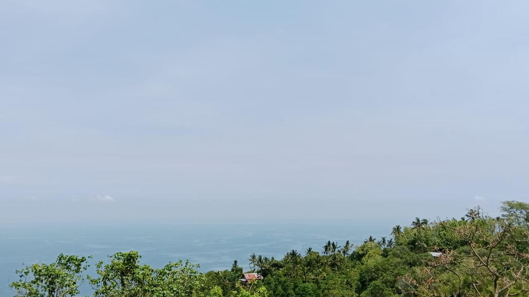 Prime Hillside Plot with Breathtaking Ocean Vista in Cempaga