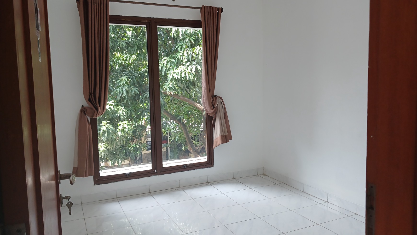 Rumah Minimalis, bebas banjir dalam cluster di Bintaro Sektor 9