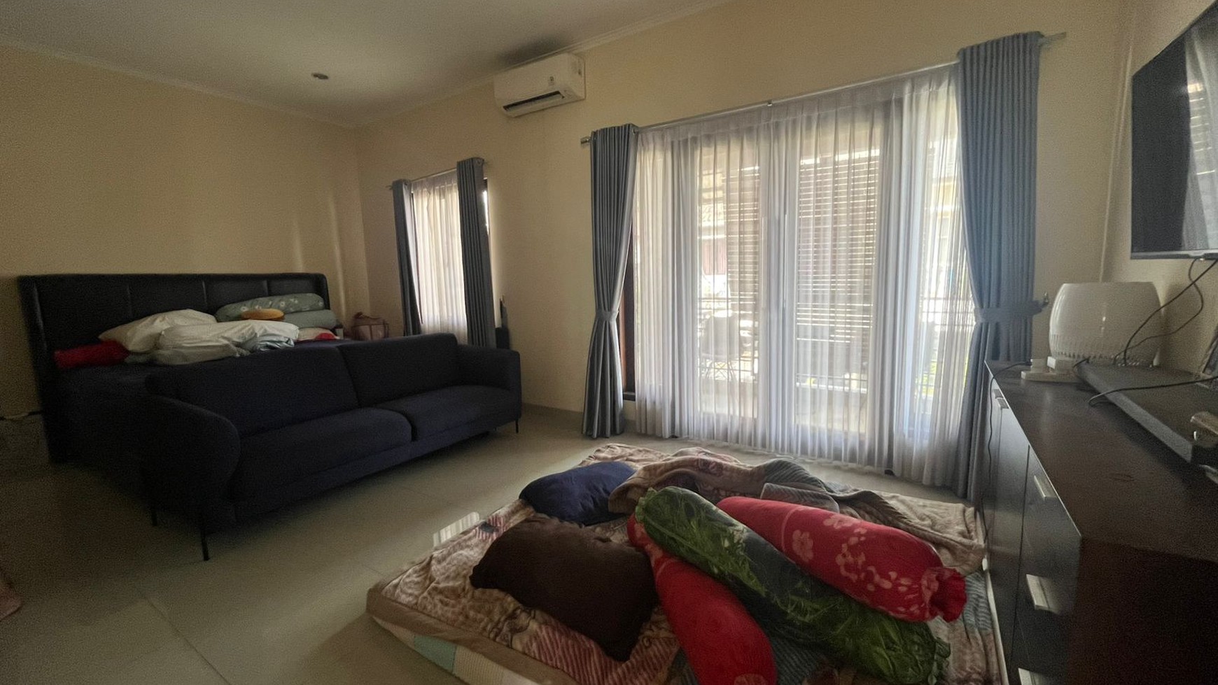 Jual murah dan cepat, Rumah cluster kecil di Anggrek Loka