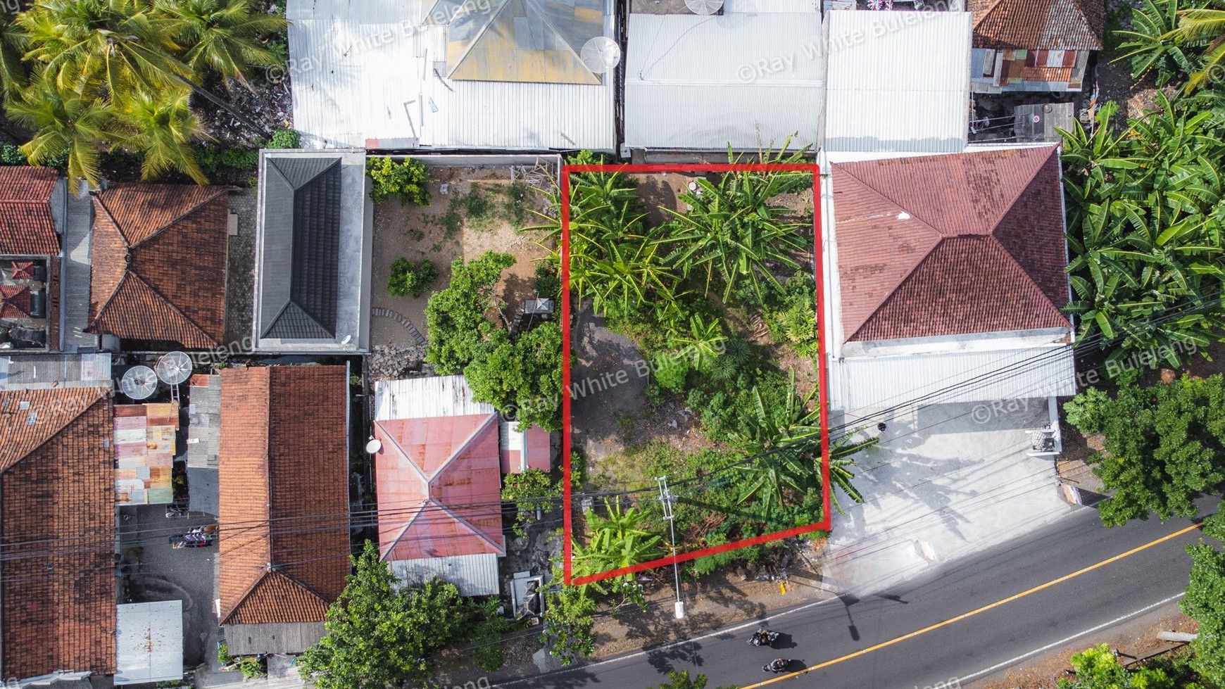 Land next to the main road for sale