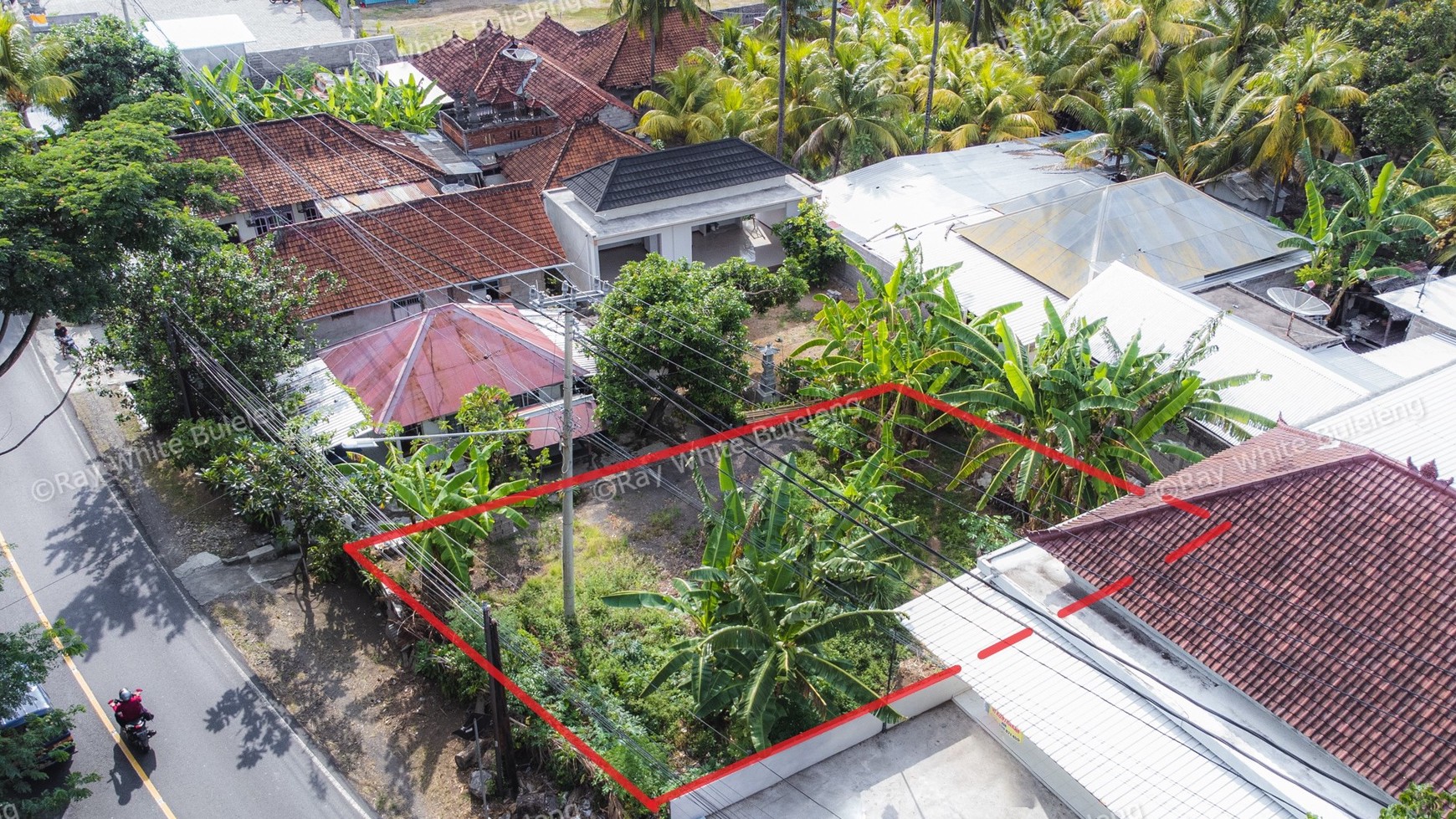 Land next to the main road for sale