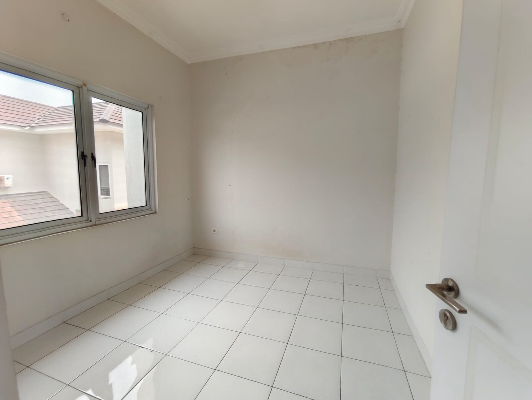 Rumah di Kota Wisata