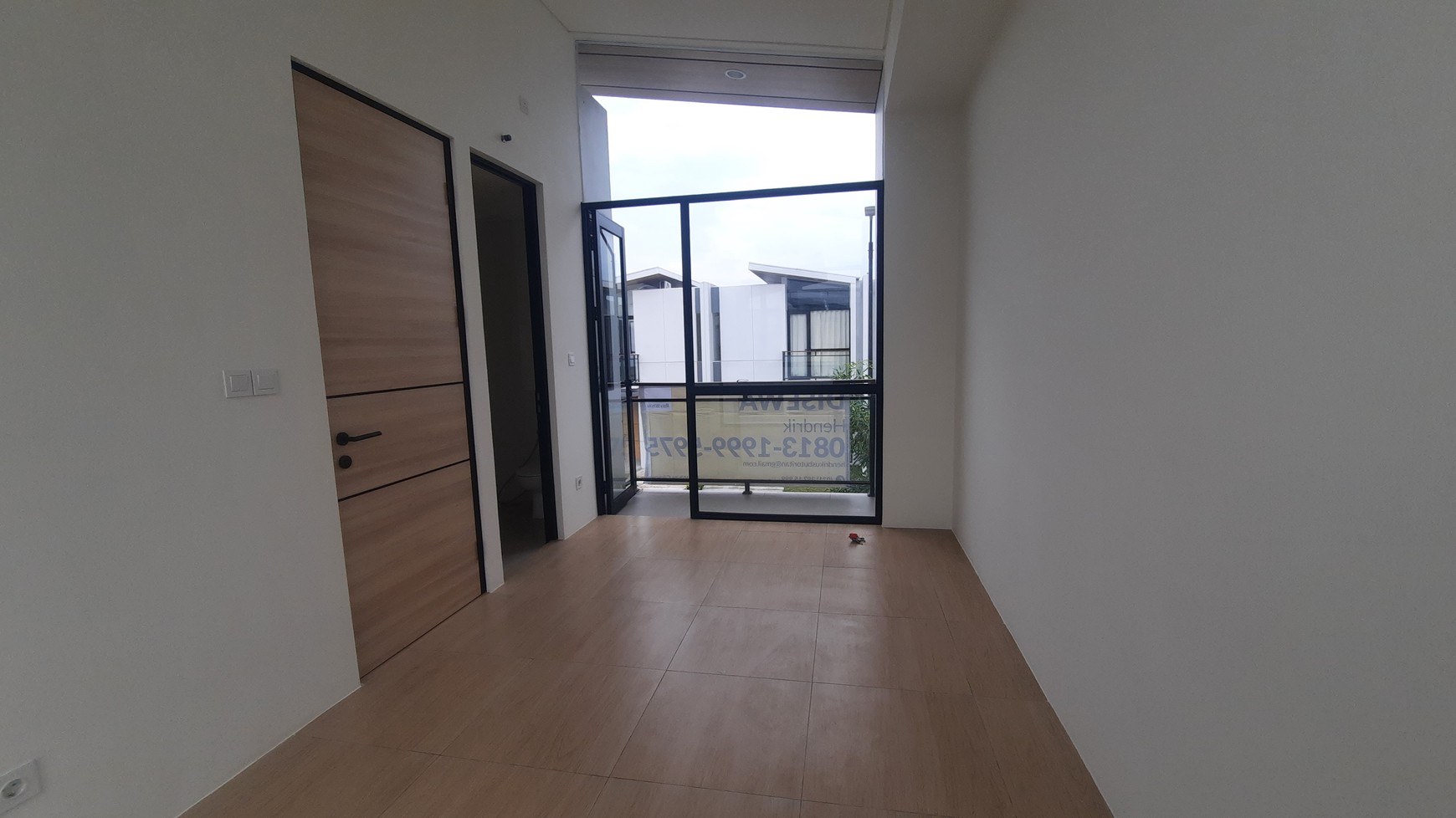 RUMAH MINIMALIS MODERN DI LOKASI STRATEGIS DEKAT JALAN BOULEVARD LIPPO CIKARANG DI CLUSTER CENDANA SPARK