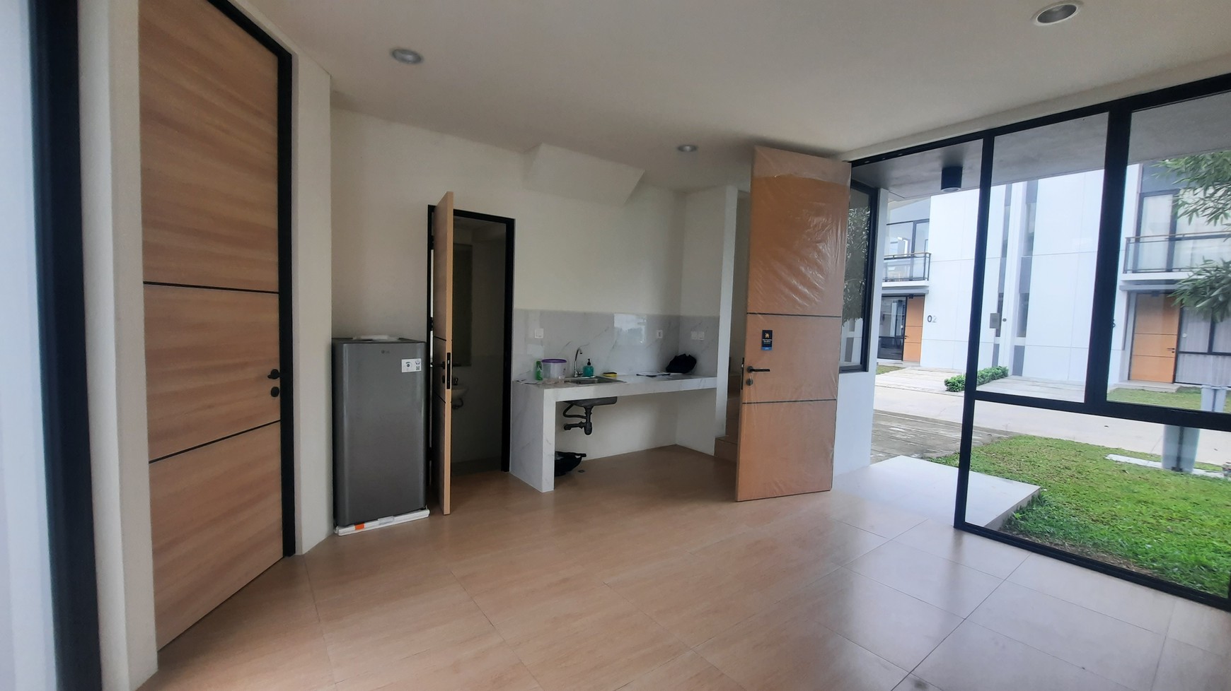 RUMAH MINIMALIS MODERN DI LOKASI STRATEGIS DEKAT JALAN BOULEVARD LIPPO CIKARANG DI CLUSTER CENDANA SPARK