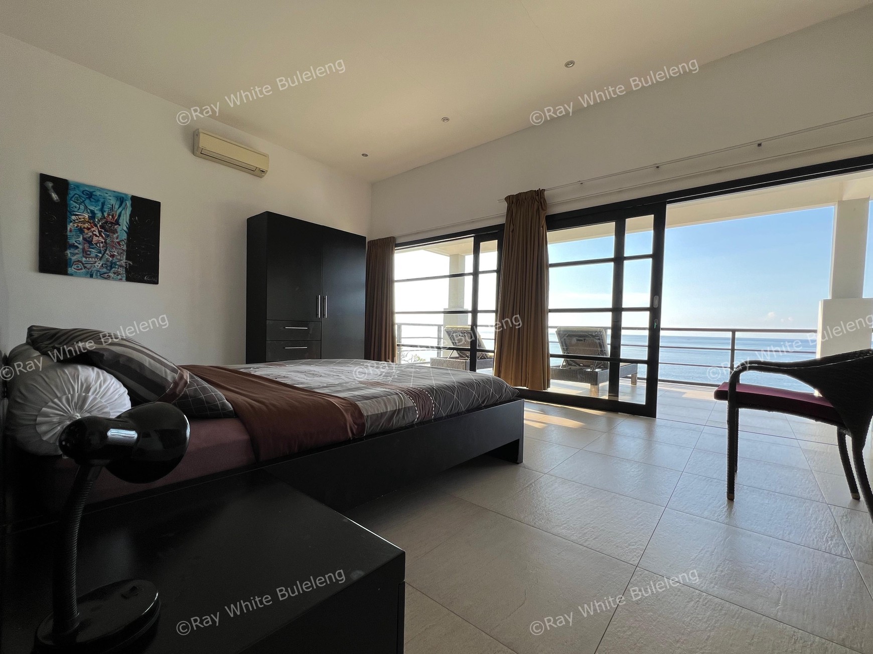 Elegant Beachfront Villa with Ocean View Terrace & Expansive Grounds