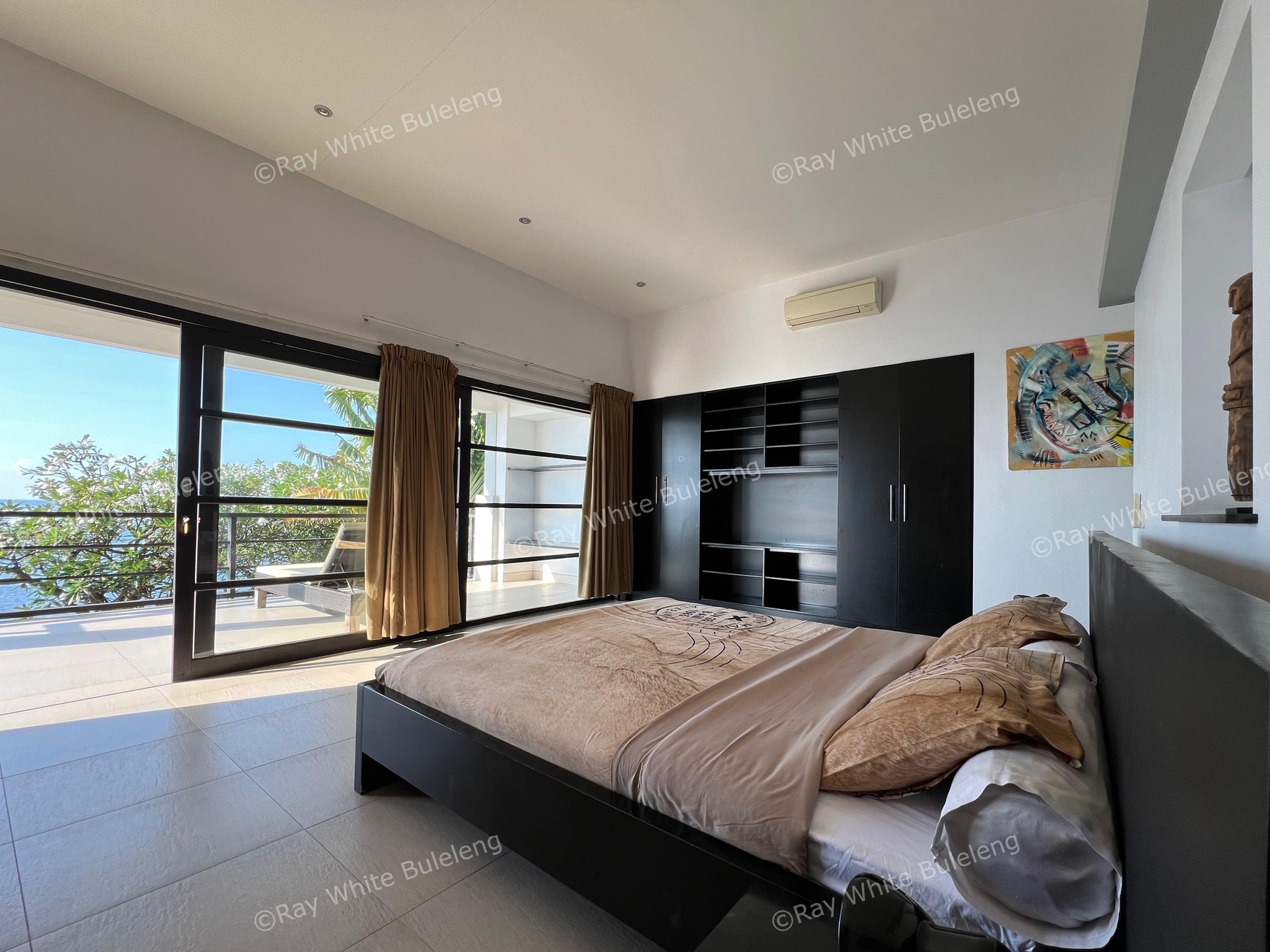 Elegant Beachfront Villa with Ocean View Terrace & Expansive Grounds