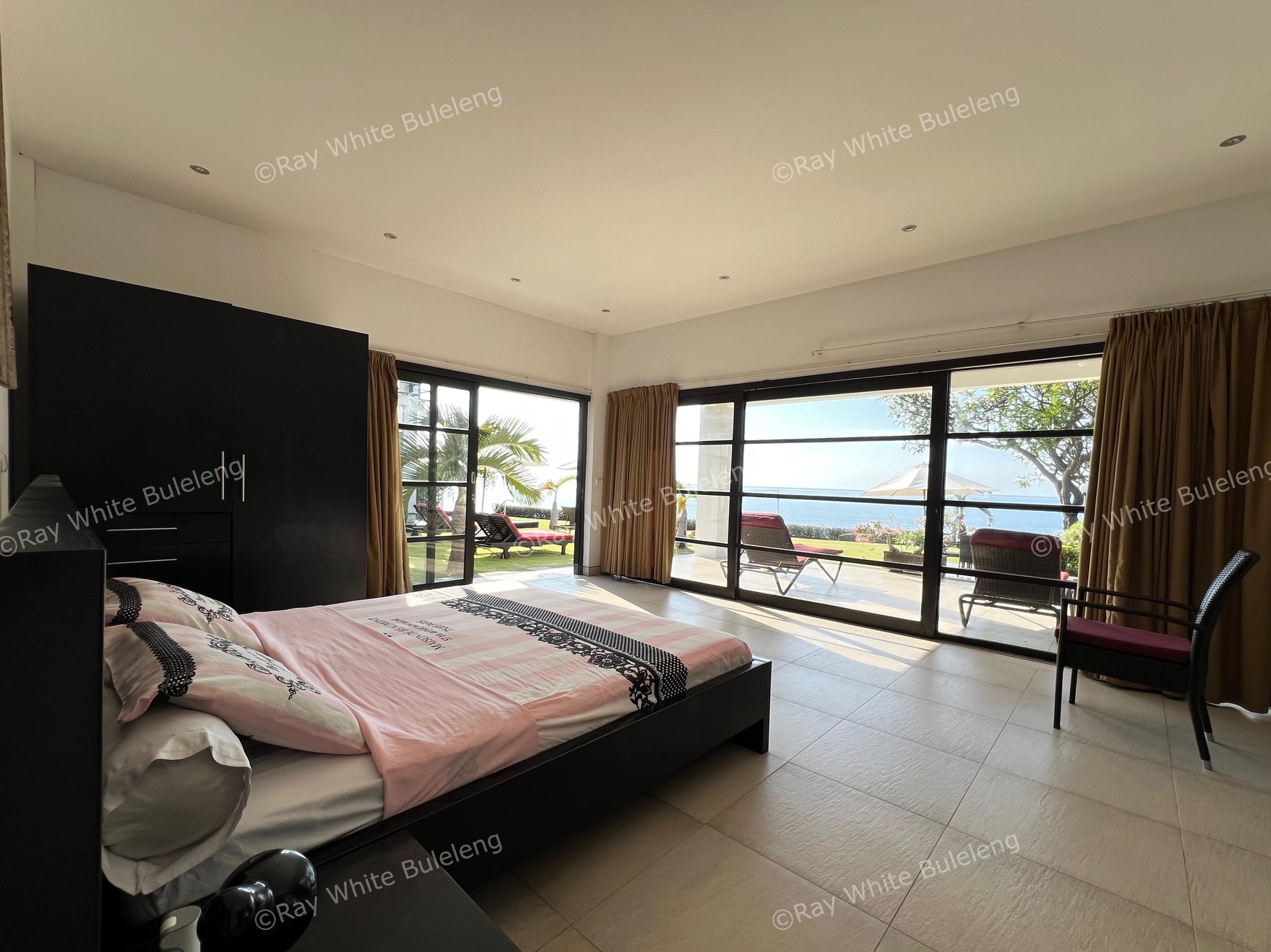 Elegant Beachfront Villa with Ocean View Terrace & Expansive Grounds
