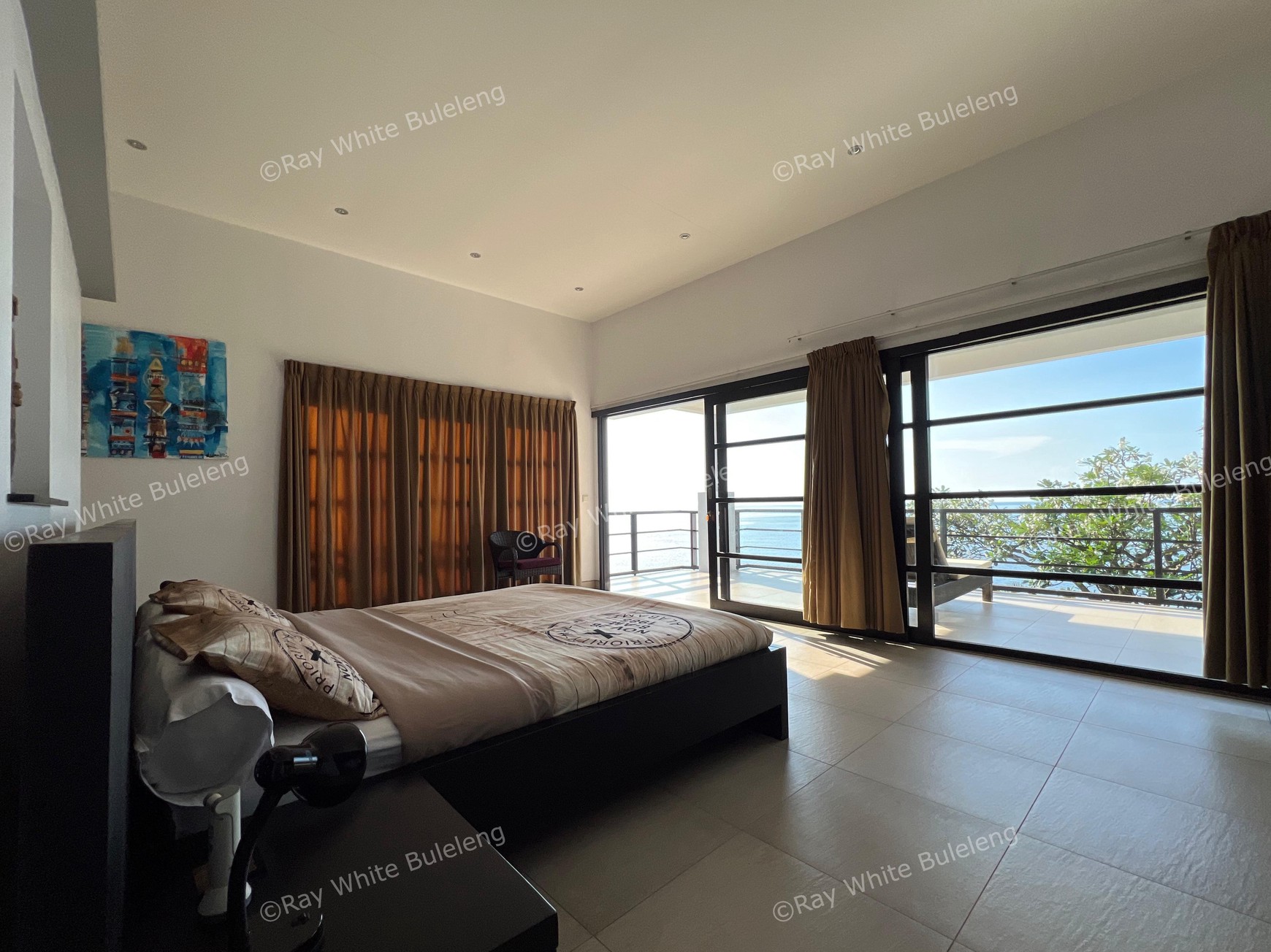 Elegant Beachfront Villa with Ocean View Terrace & Expansive Grounds