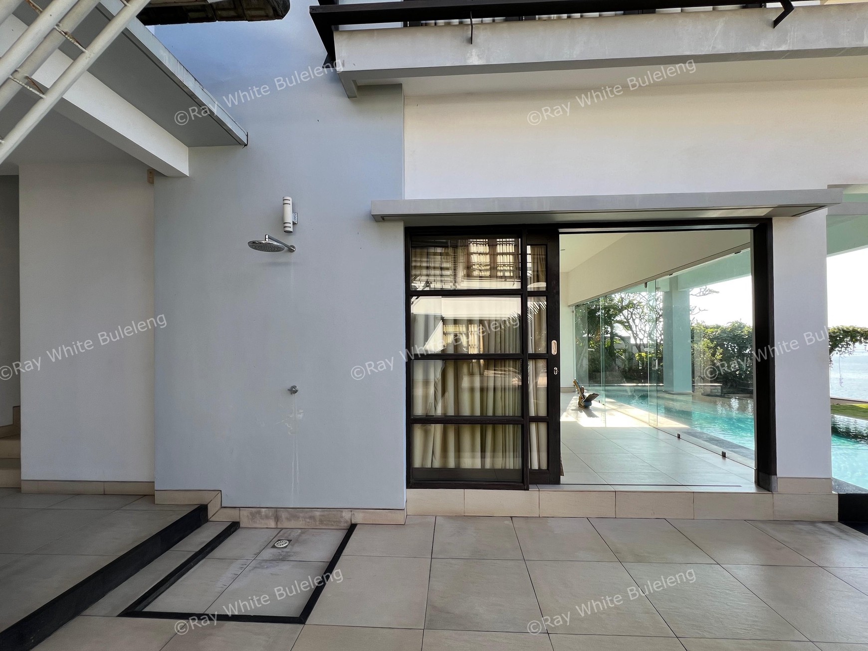 Elegant Beachfront Villa with Ocean View Terrace & Expansive Grounds