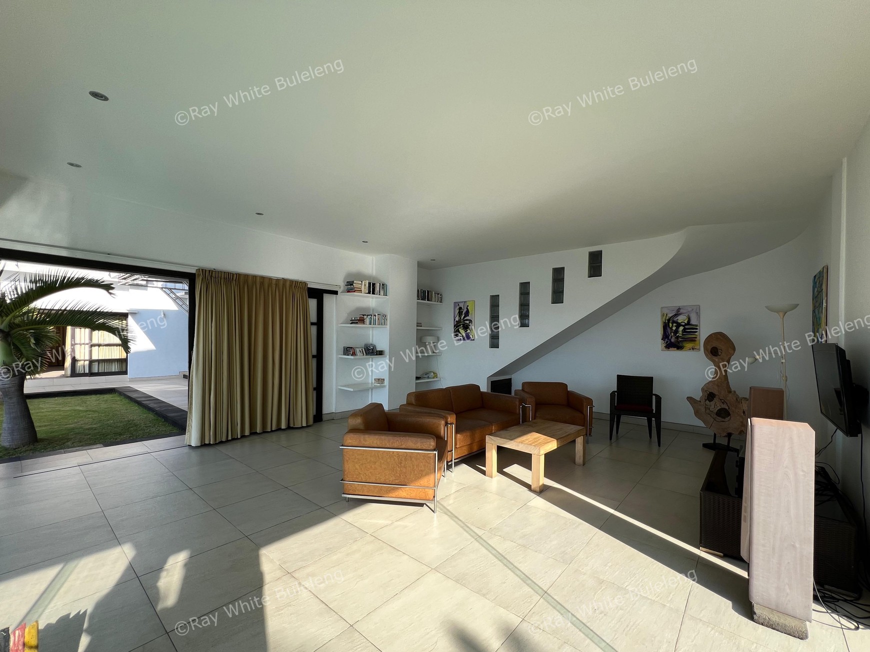 Elegant Beachfront Villa with Ocean View Terrace & Expansive Grounds
