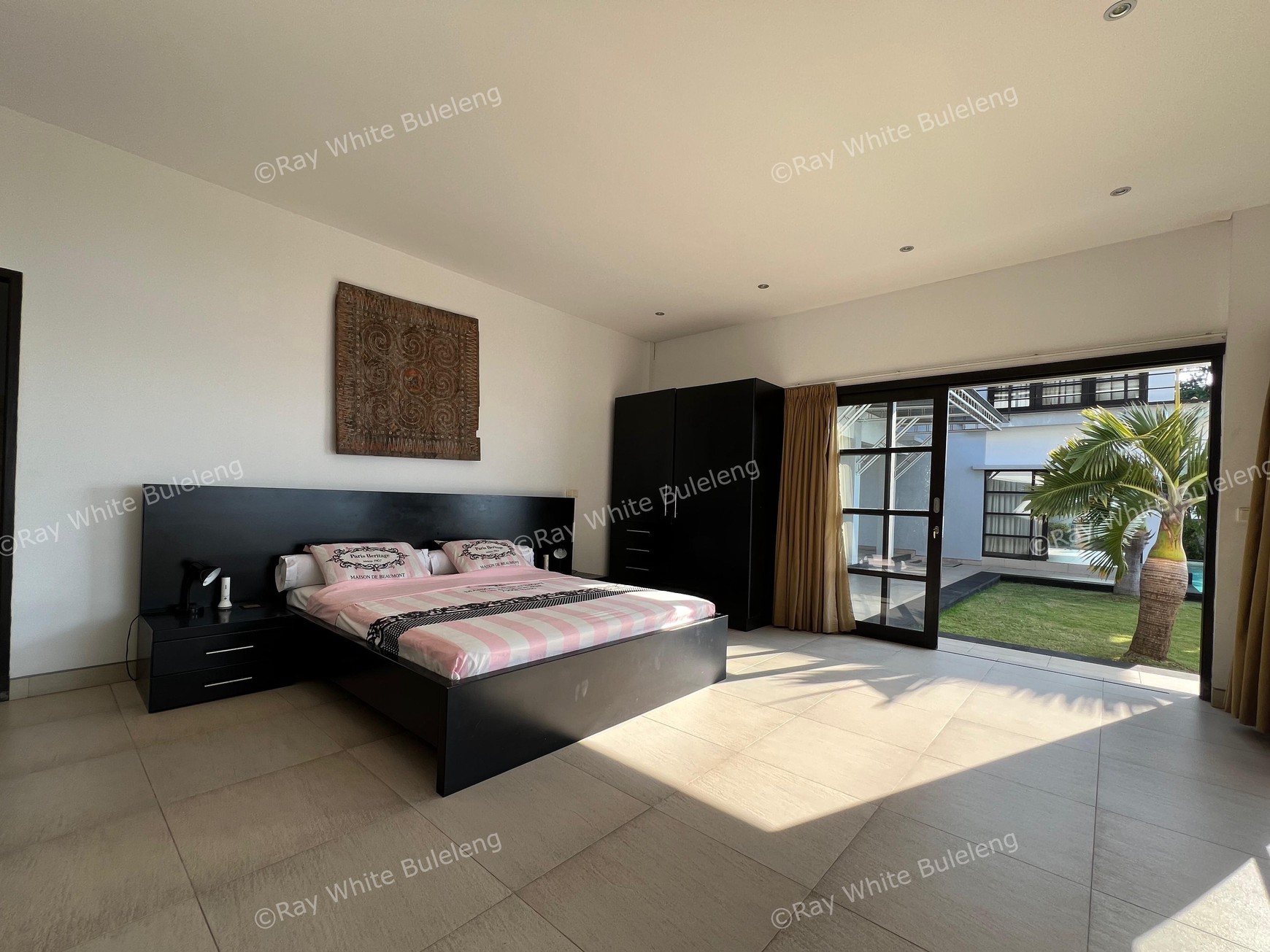 Elegant Beachfront Villa with Ocean View Terrace & Expansive Grounds