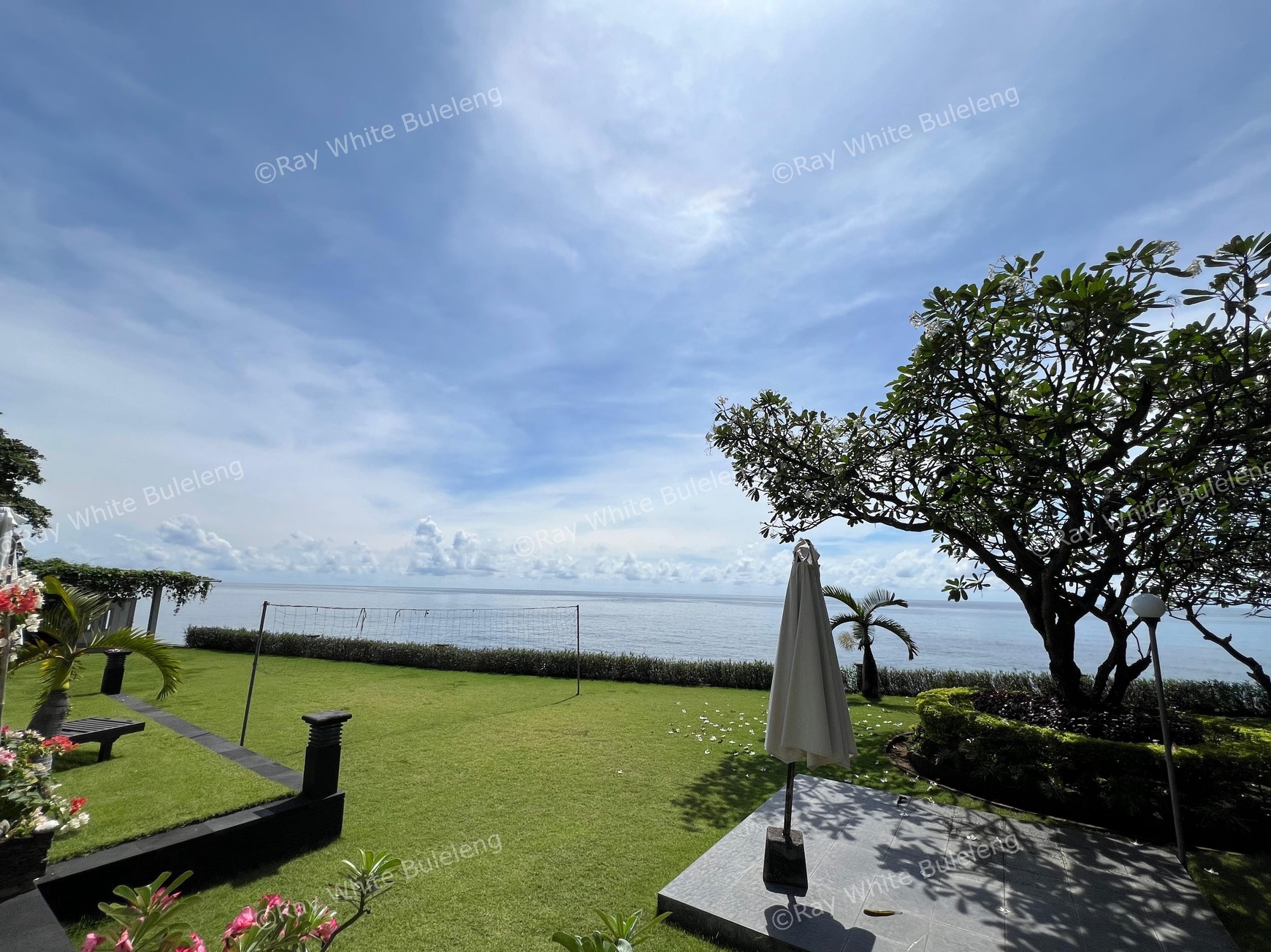 Elegant Beachfront Villa with Ocean View Terrace & Expansive Grounds