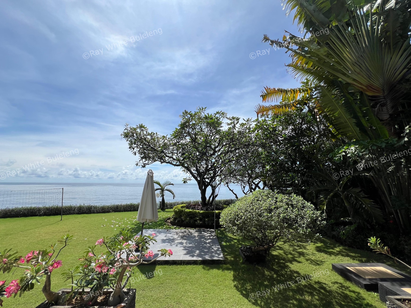 Elegant Beachfront Villa with Ocean View Terrace & Expansive Grounds