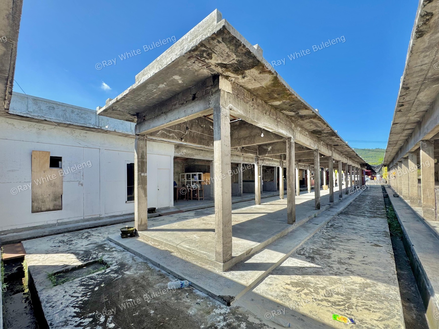 STRATEGIC COMMERCIAL PROPERTY WITH 26 SHOP UNITS ON MAIN ROAD